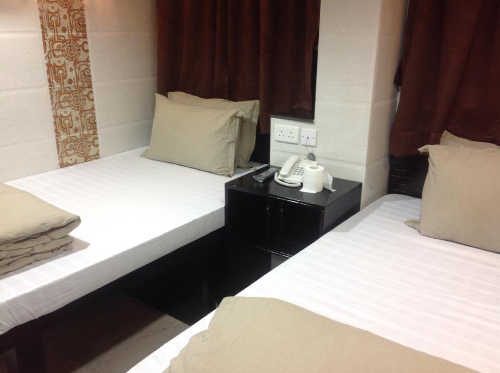 New Euro Asia Guest House Гонконг Номер фото