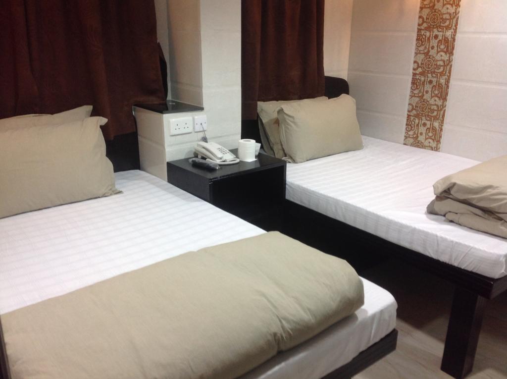 New Euro Asia Guest House Гонконг Номер фото
